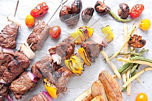 beef shish kabob skewers with vegetables