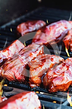 Beef Short RIbs with BBQ Sauce on a Hot Grill