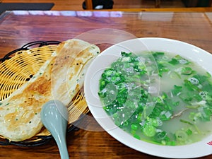 Beef Soup and baked read - Chinese food photo