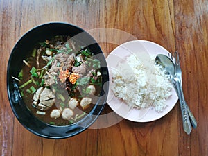 beef soup with steam rice, beef noodle soup, herb and vegetable