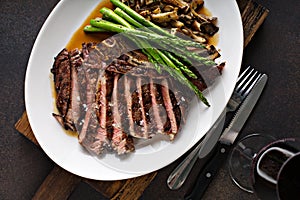 Beef steak with asparagus and mushrooms