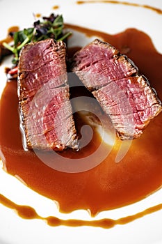 Beef steak filet Mignon medium rare in demiglas sauce