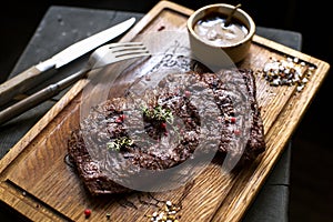 Beef steak. Piece of Grilled BBQ beef marinated in spices - Stock Image