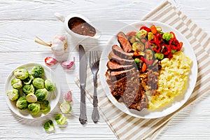 beef steak with potato mash and roasted vegetables