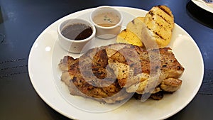 Beef steak serve with garlic bread good smell and yummy