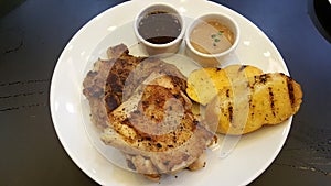 Beef steak serve with garlic bread good smell and yummy