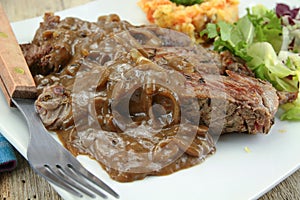 Beef steak with shallot sauce