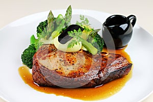 Beef steak with  vegetables at restaurant.