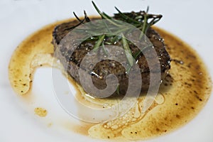 Beef steak on a white plate