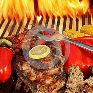 Beef steakes on BBQ grill