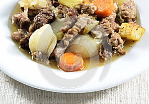 Beef stew with french fries salad