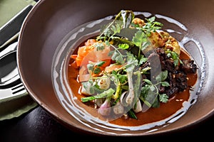 beef stir fry with vegetables in a bowl