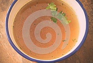 Beef stock with parsley top view