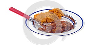 Beef and sweet potato TV dinner on plate