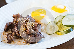 Beef tapa with rice and egg photo
