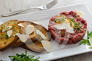 Beef tartar, toast bread with garlic