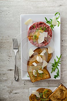 Beef tartar, toast bread with garlic