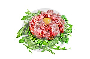 Beef tartare with arugula and quail egg. Isolated on white background, Top view.