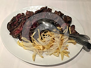 Beef tenderloin with french fries