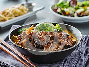 Beef teriyaki bowl with noodles and vegetables