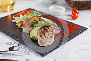 Beef tongue grilled with herbs and vegetables