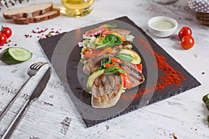 Beef tongue grilled with herbs and vegetables