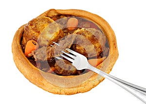 Beef and vegetable stew in a Yorkshire pudding