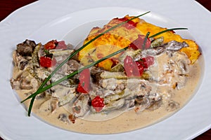 Beefstroganoff with pickled cucumbers