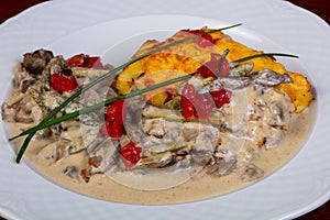 Beefstroganoff with pickled cucumbers