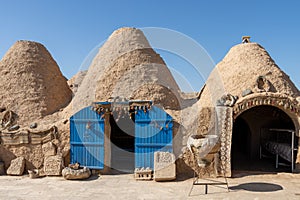 A beehive or tomb house is a building made from a circle of stones and mud topped with a domed roof