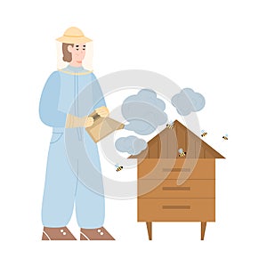 Beekeeper at apiary with smoker pollinates bees and hive by smoke for take honey