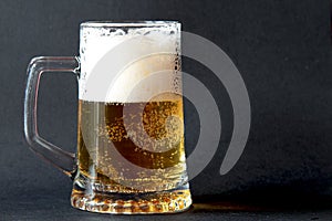 Glass of frothy beer