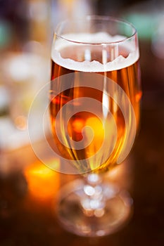 Beer in beer glass with very shallow depth of field