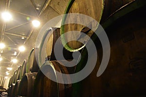 Beer being brewed in an old oak barrel brewery
