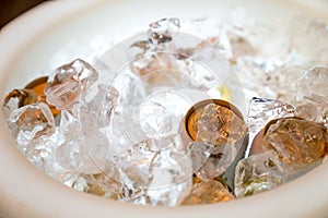 Beer and beverage in the ice storage with the LED light hilight at the bottom ready to serve