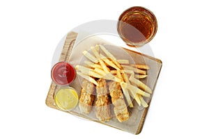 Beer and board with fried fish and chips, and sauces isolated on white background