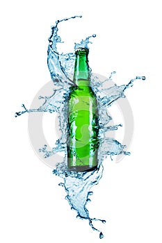 Beer bottle being poured in a water