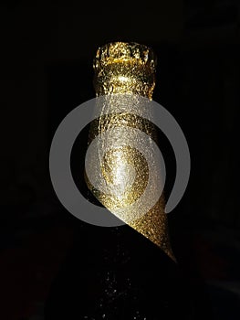 Beer bottle closeup photo in night Beautiful golden colour with nice black colour background