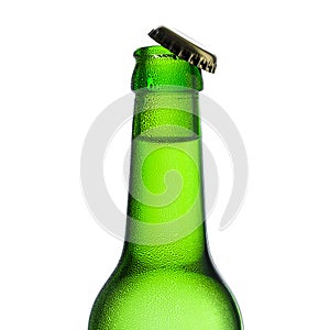 Beer bottle with kron cork and drops of condensation dew party drink alcohol