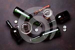 Beer bottles, lager beer glass and mug, bottle opener