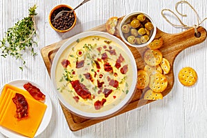 Beer cheese soup in bowl, top view