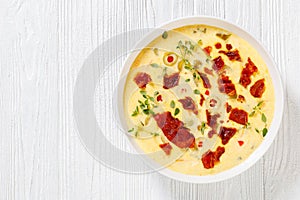 Beer cheese soup in bowl, top view