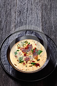 Beer cheese soup in bowl, top view