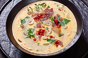 Beer cheese soup in bowl, top view