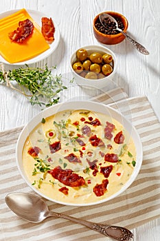 Beer cheese soup in bowl, top view