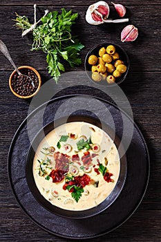 Beer cheese soup in bowl, top view