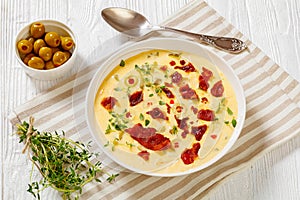 Beer cheese soup in bowl, top view