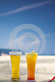 Beer and cocktail by the beach