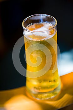 Beer. Cold Craft light Beer in a glass with water drops