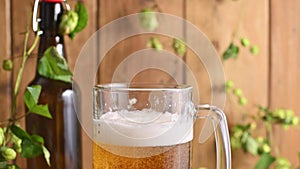 Beer. Cold Craft light Beer in a glass with water drops. Pint of Beer close up